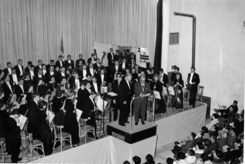 At the concert in Luxembourg, Dr. Hanson and the Eastman Philharmonia members are congratulated by one of the local dignitaries (yetunidentified).