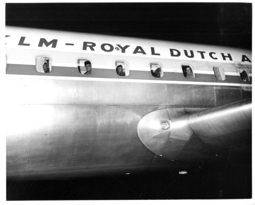 The chartered KLM Royal Dutch Airlines DC-8 on arrival at Niagara Falls Airport on the night of February 25th-26th, 1962. Several Eastman Philharmonia members are visible looking out the airplane’s windows. Eastman School Photo Archive.