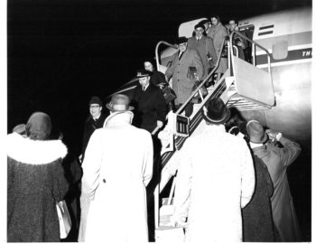 Members of the Eastman Philharmonia begin to de-plane from the KLM DC-8, led first of all by Dr. and Mrs. Hanson. Eastman School Photo Archive.