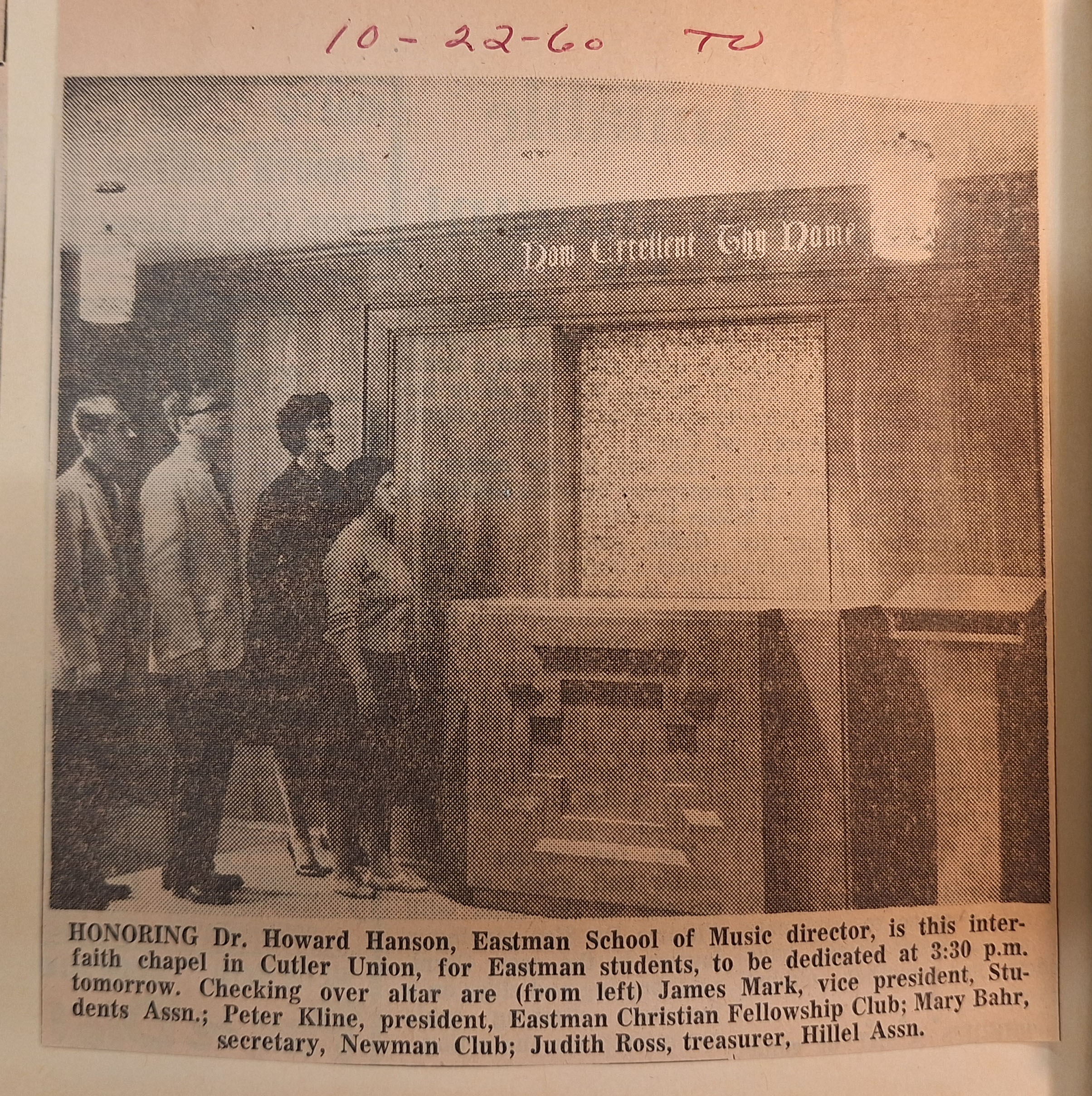 A press photo of four Eastman School students in the new chapel. Preserved in scrapbook no. 19, Howard Hanson Collection.