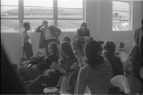 Photographer Louis Ouzer accompanied the Eastman musicians on their three-city tour. These shots capture ensemble members and their directors in candid moments during travel.