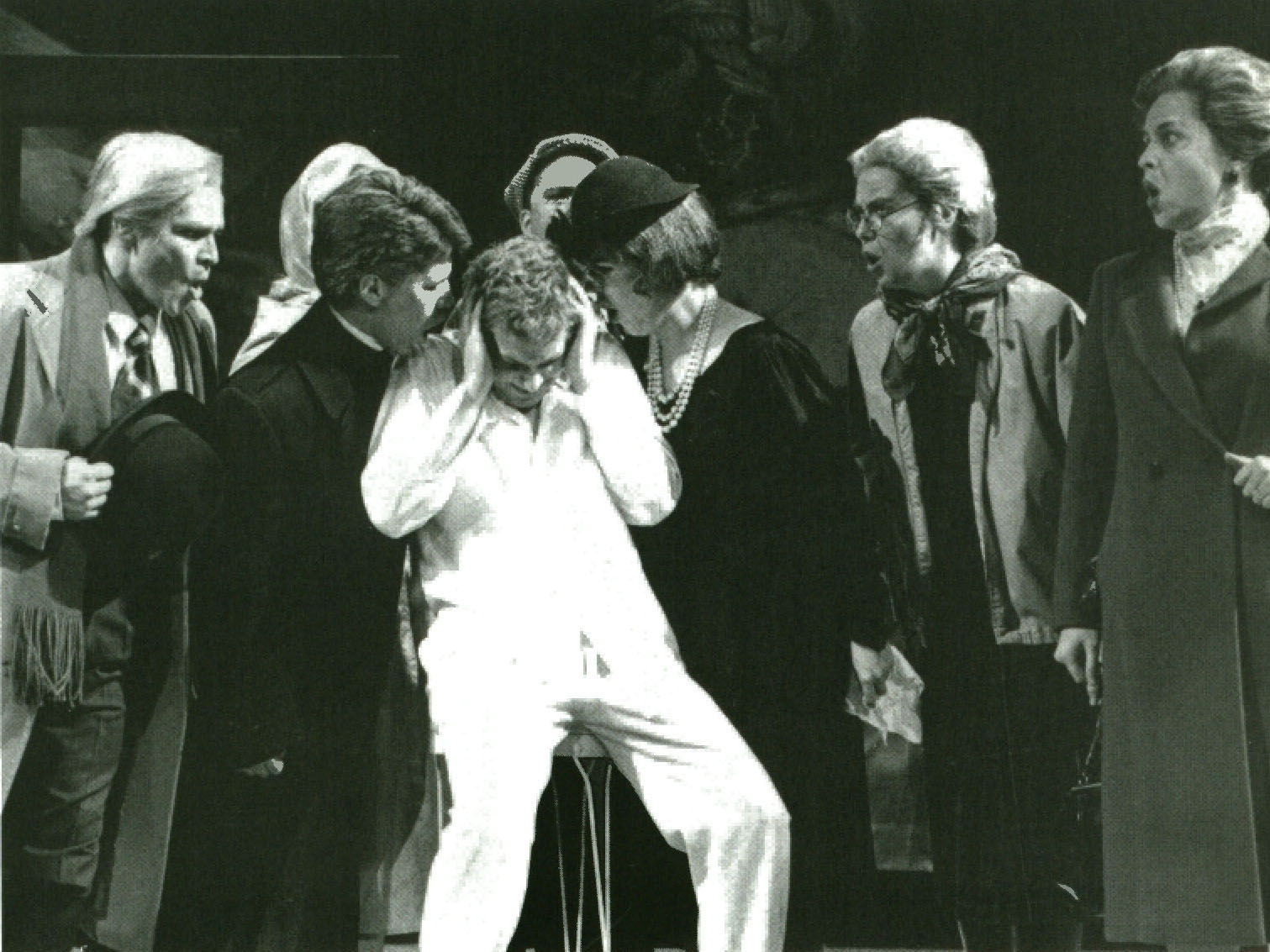 Albert receives rebuke and tongue-lashings upon his return after his night of debauchery, act III. Photo in The Score 1989.