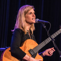 Dawn Thomson with guitar