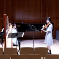 Two women playing and recording Prokofiev’s "Cinderella Suite" for harp and viola in Kilbourn Hall